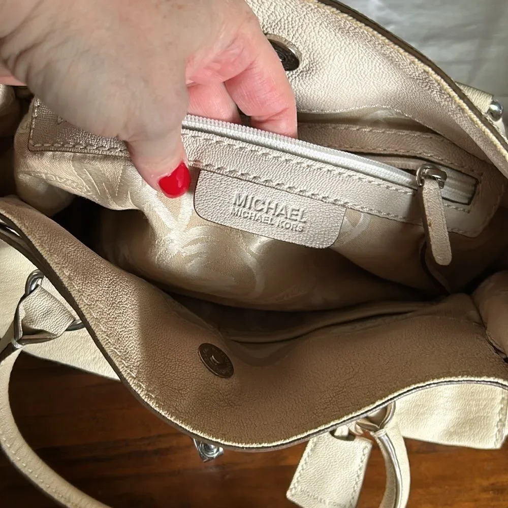 Michael Kors handbag silver lock and keys tan color impeccable